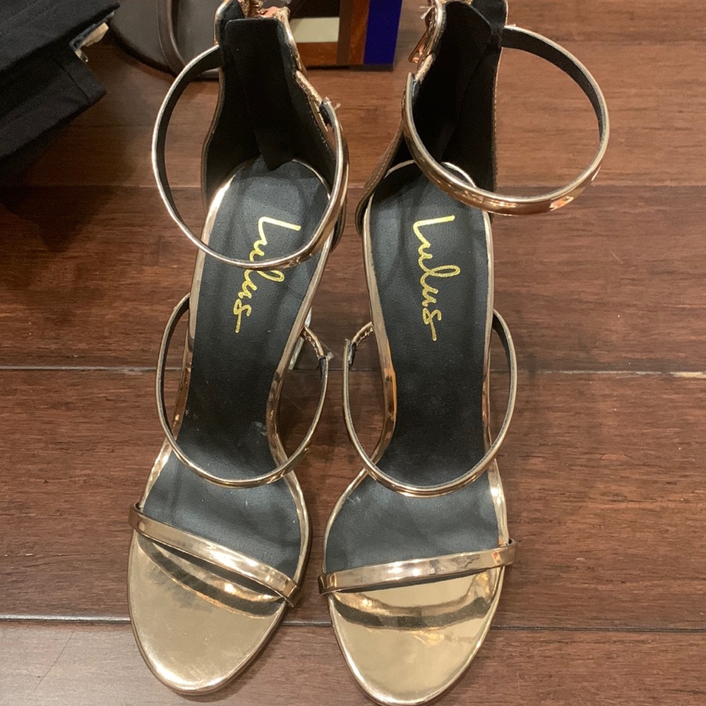 Gold high heel sandals new but w small mark